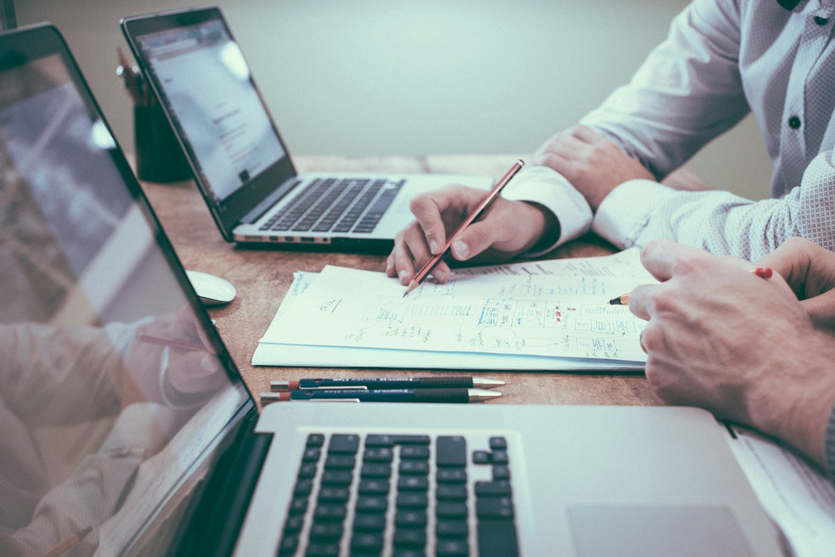 Business professionals reviewing documents together
